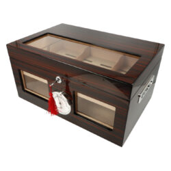 Humidor na doutníky ebenový lesklý 80D, 38x25x19cm - Atraktivn humidor na doutnky s kapacitou cca na 80 doutnk (v zvislosti na velikosti). Stoln zamykac humidor s prhlednm vkem a povrchem ve vysokm lesku. Povrch v odstnu ebenovho deva m vraznj kresbu. Prhledn vko je vyplnn irou akrylovou vpln, dky kter vidte na sv doutnky. Pro skladovn doutnk mte k dispozici dv patra. K rozdlen jednotlivch pater slou cedrov pepky. Ve spodnm pate je mon doutnky skladovat nejen jednotliv, ale tak po celm balen. V hornm vyndavacm pate pouze jednotliv. Cel vnitn prostor humidoru je vyloen cedrovm devem, kter prospv skladovn doutnk. Pro pohodlnou manipulaci s humidorem najdeme na bocch madla. Precizn zpracovan humidor je dodvan s polymerovm zvlhovaem a vmnnm analogovm vlhkomrem, kter je zasunut v eln sti. Zvlhova v humidoru uchytte pomoc magnetu a kovov podloky s oboustrannou lepic pskou. Pokrbn povrchu, na kterm je humidor poloen, zabrauje jemn sametov ltka, kterou je spodn vnj st vybavena.

Celkov rozmry humidoru ( x H x V): 375 x 250 x 185 mm
Vnitn prostor pro doutnky ( x H x V): 340 x 220 x 75 mm
Vnitn rozmry hornho patra ( x H x V): 330 x 203 x 32 mm
Prmr otvoru pro vlhkomr: 55 mm
Rozmry zvlhovae ( x H x V): 165 x 21 x 64 mm
Distributor: Fortis-DB, spol. s r.o.

Humidory jsou dodvny nezavlhen, proto Vm nabzme bezplatnou volitelnou slubu Zavlhen humidoru, kterou si vyberete v Souvisejcm zbo. Nov humidor je nutn ped prvnm uloenm doutnk zavlhit, upravit a ustlit jeho vlhkost na poadovanou hodnotu. Dobe zavlhen humidor uchov Vae doutnky ve skvl kondici.

a target=_blank href=..\www\prilohy\Nvod_k_pouit_humidoru.pdfNvod k pouit humidoru - PDF/a
